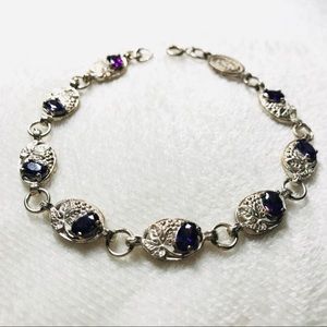 Silver bracelet with amethyst stones